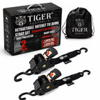 Tiger Australia retractable ratchet tie-down strap set with packaging and drawstring bag on a white background
