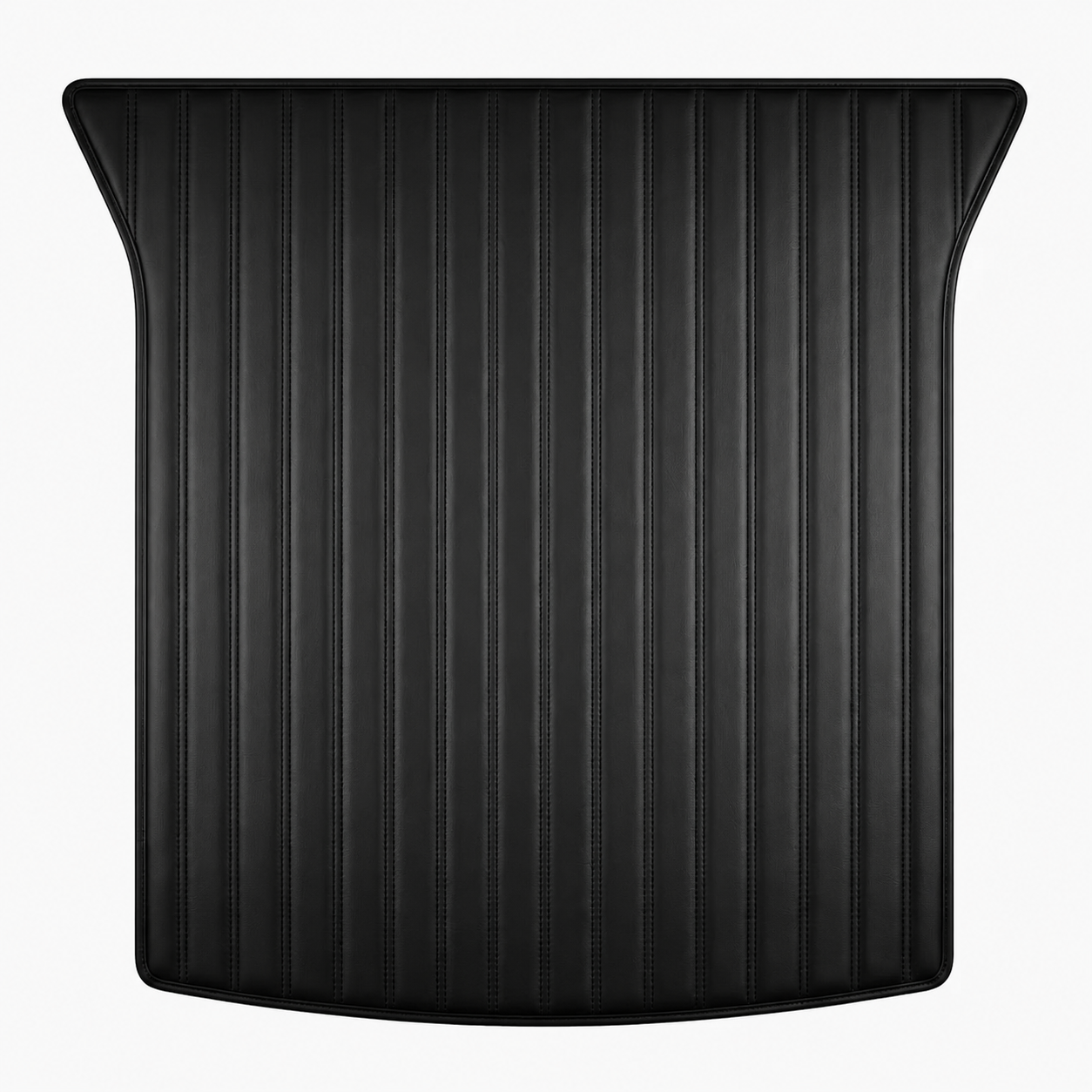 A black textured trunk liner with vertical ribbed grooves and curved outer edges, shown against a plain white background.
